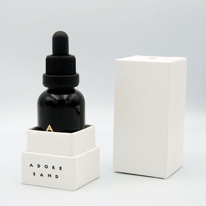 fragrance oil bottle close-up with glass detail